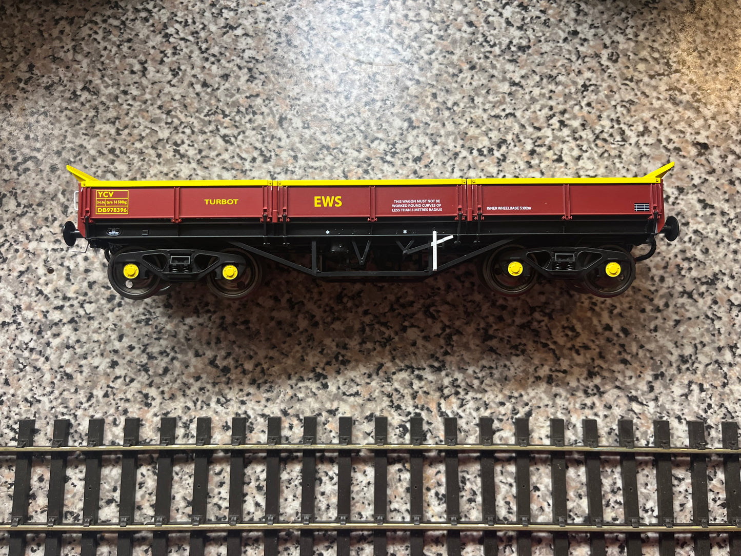 Dapol (O) Ex British Rail, YCV “Turbot” No.DB978396 in EWS Yellow and Maroon.