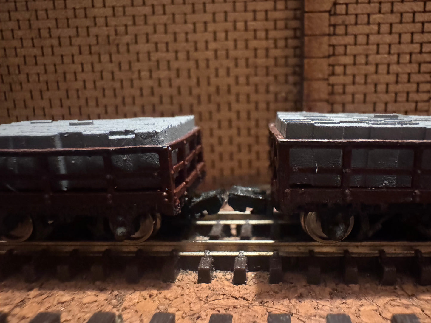 Manufacturer Unknown (OO9) Set of Three Loaded Slate Wagons. 