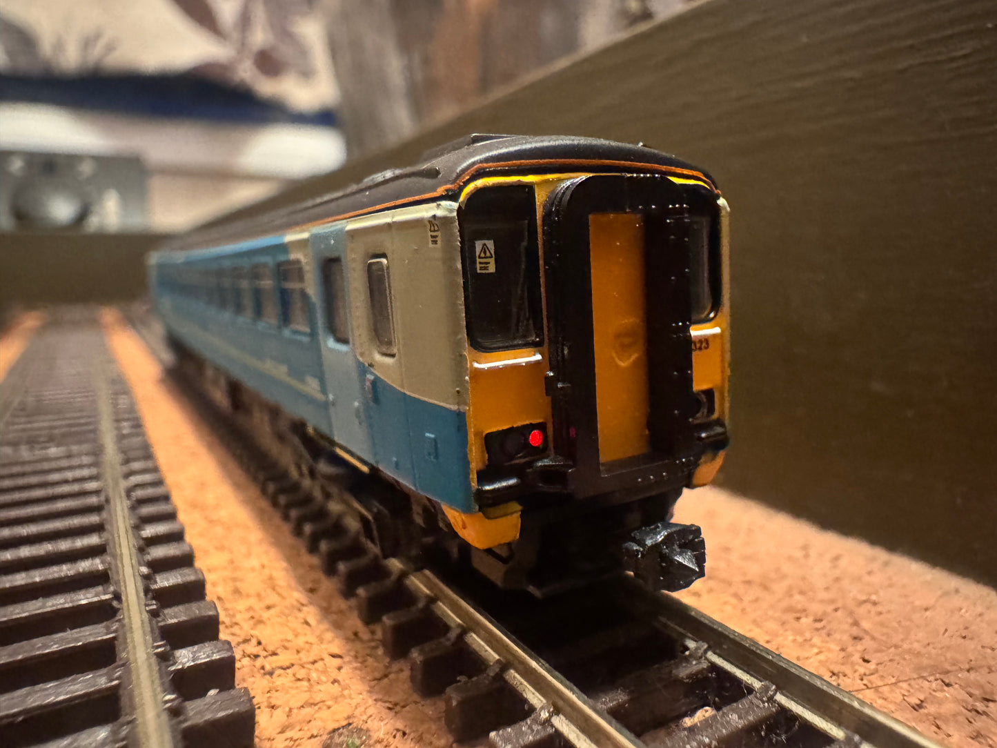 Dapol 2D-020-004D (N Gauge) Ex BR Class 153 Sprinter No.153323 in Arriva Trains Wales livery. DCC ready. 