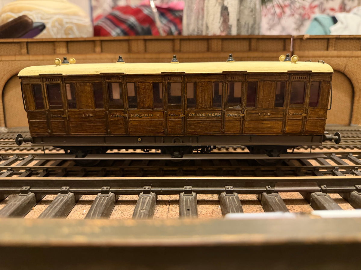 Manufacturer Unknown (O Gauge) Midland & Great Northern Joint Railway, Six Wheel Third Class Compartment Coach No.110. In Work Worn Teak 