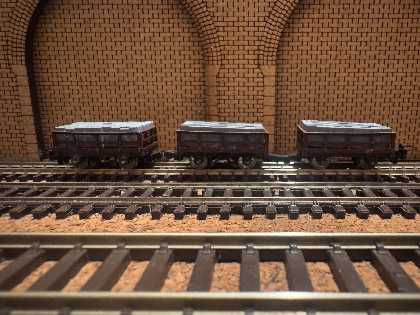 Manufacturer Unknown (OO9) Set of Three Loaded Slate Wagons. 