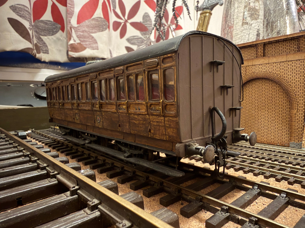 Manufacturer Unknown (O Gauge) Ex E&MR Six Wheel Composite Coach No.56 in work worn Midland & Great Northern Joint Railway Teak. 