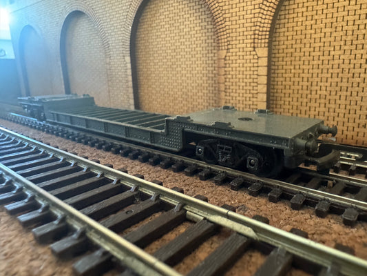 Tri-ang T.173 (TT) British Railways Bogie Well Wagon No.S61077 in BR Grey 