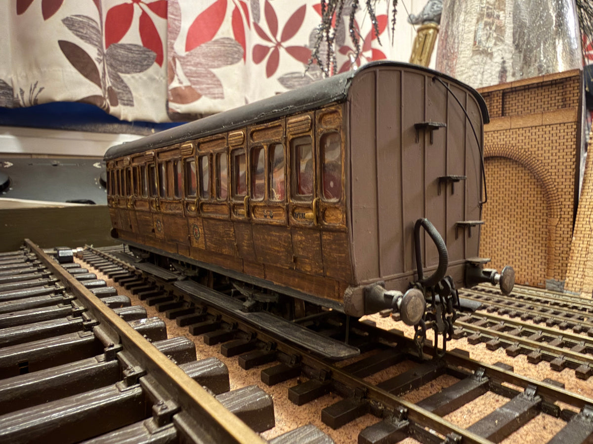 Manufacturer Unknown (O Gauge) Ex E&MR Six Wheel Composite Coach No.56 in work worn Midland & Great Northern Joint Railway Teak. 