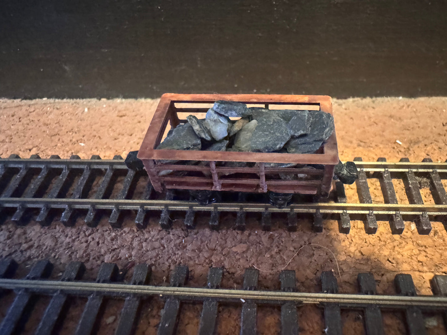 Manufacturer Unknown (OO9) Slate Wagon with uncut slate load, and magnetic couplings. 