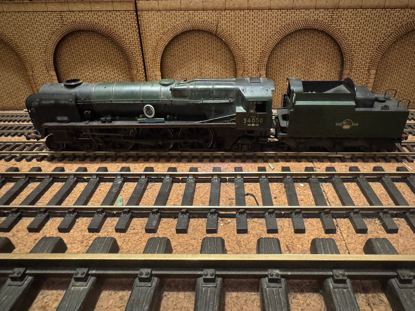 Hornby R3618 (OO) Ex SR, Rebuilt Battle of Britain No.34050 “Royal Observer Corps” in heavily weathered British Railways Green. (Shed Code 70A, Nine Elms) DCC Ready 