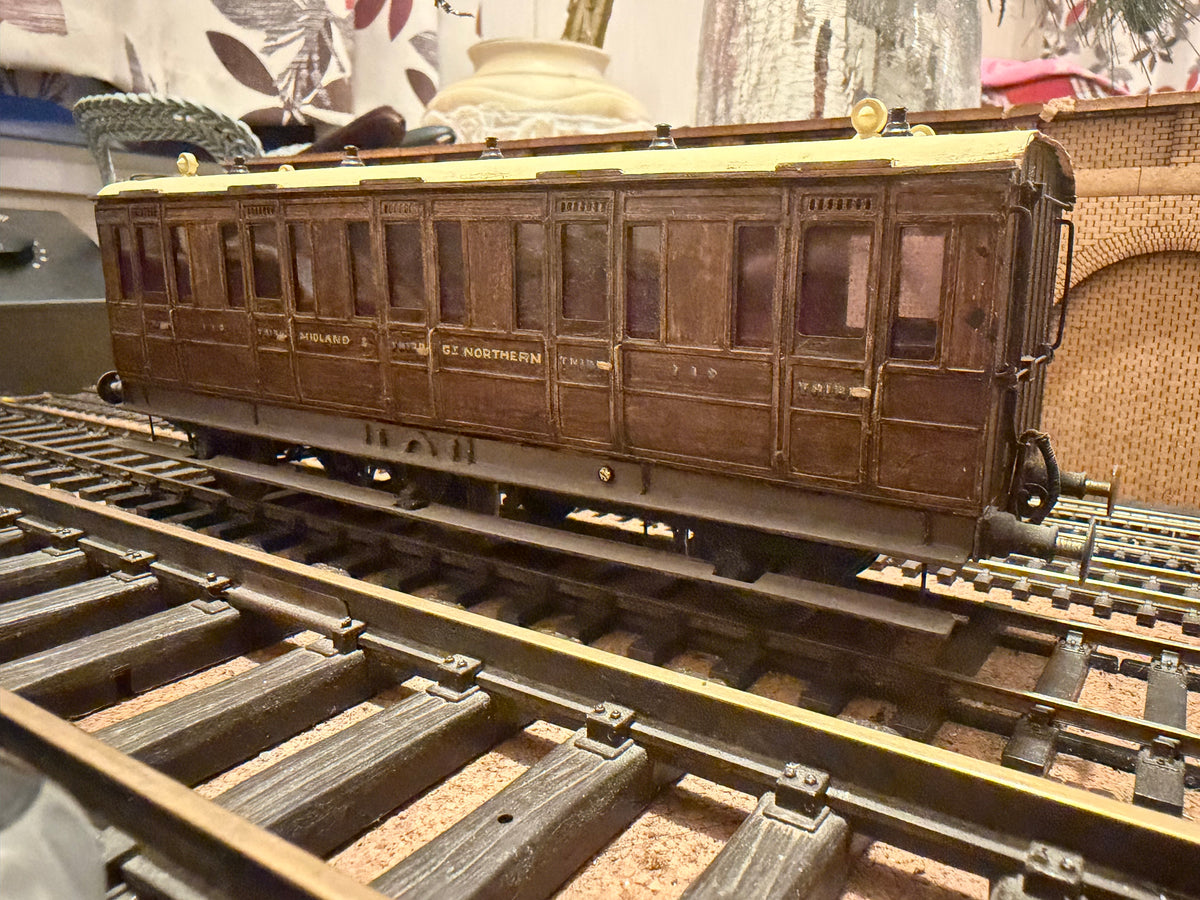 Manufacturer Unknown (O Gauge) Midland & Great Northern Joint Railway, Six Wheel Third Class Compartment Coach No.110. In Work Worn Teak 
