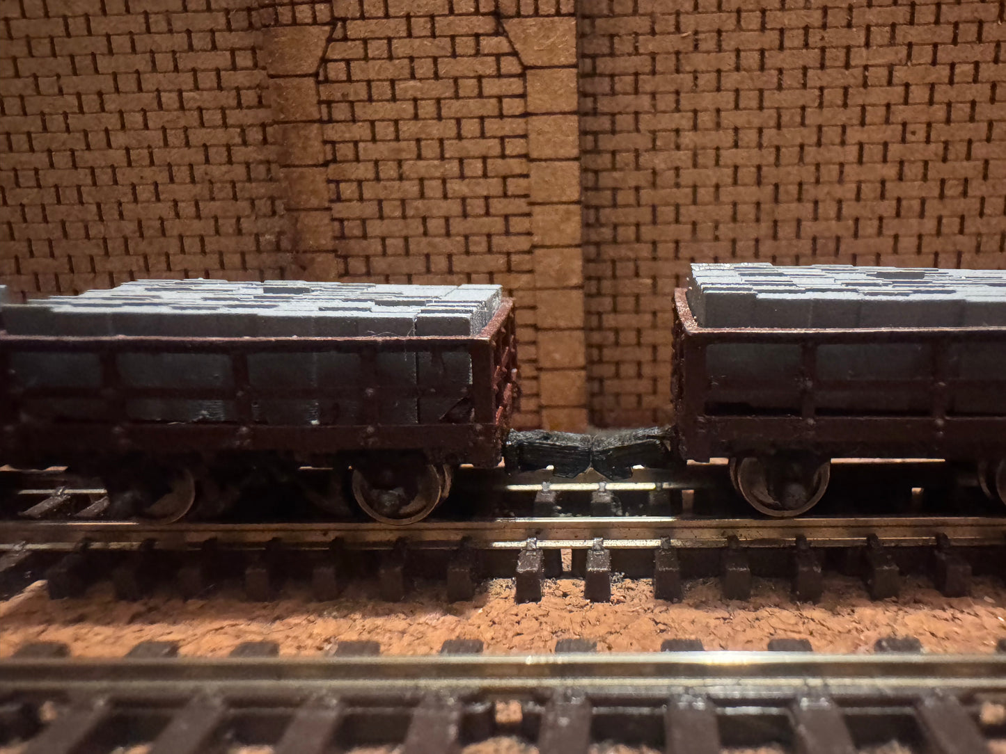 Manufacturer Unknown (OO9) Set of Three Loaded Slate Wagons. 