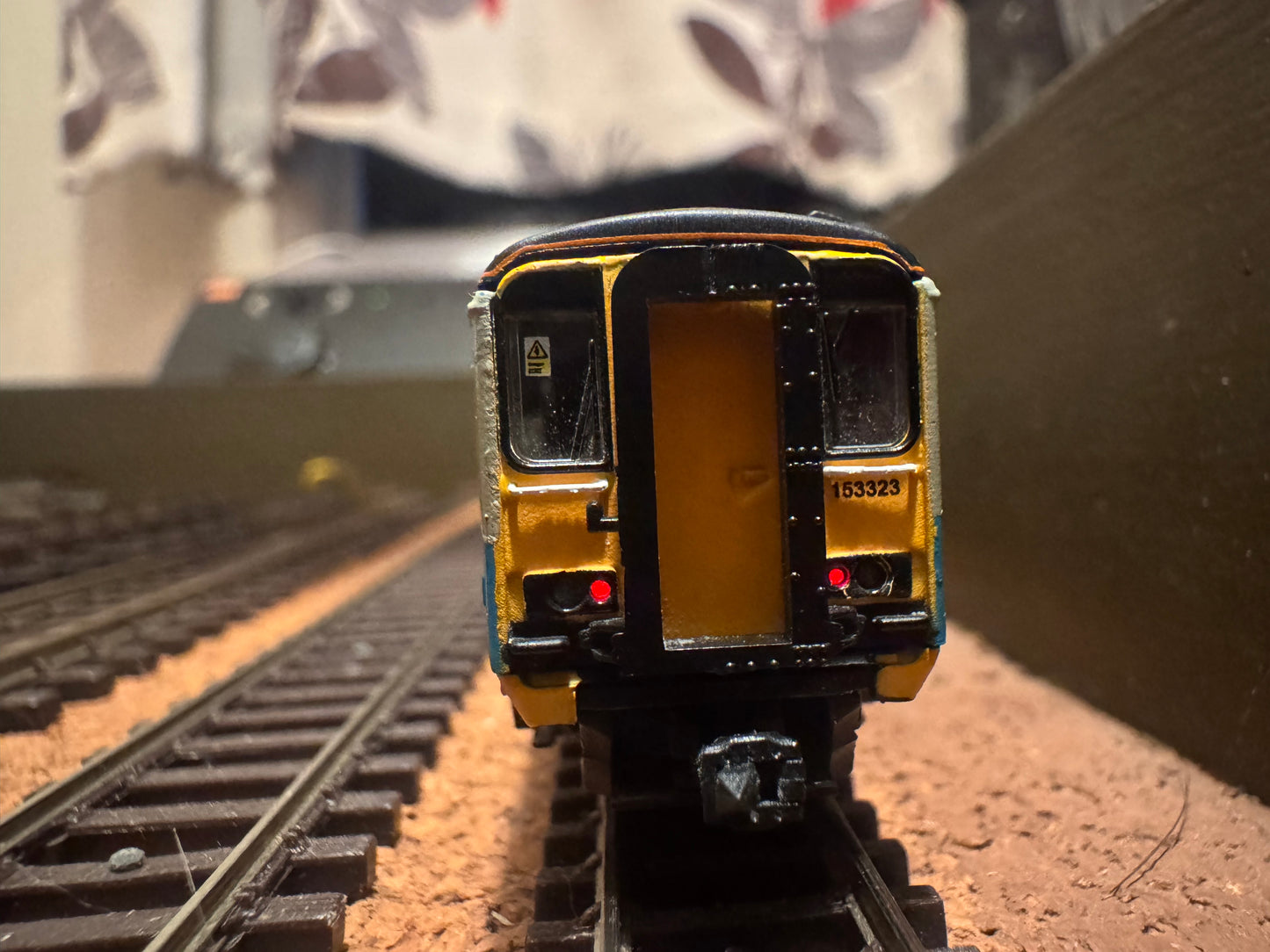 Dapol 2D-020-004D (N Gauge) Ex BR Class 153 Sprinter No.153323 in Arriva Trains Wales livery. DCC ready. 