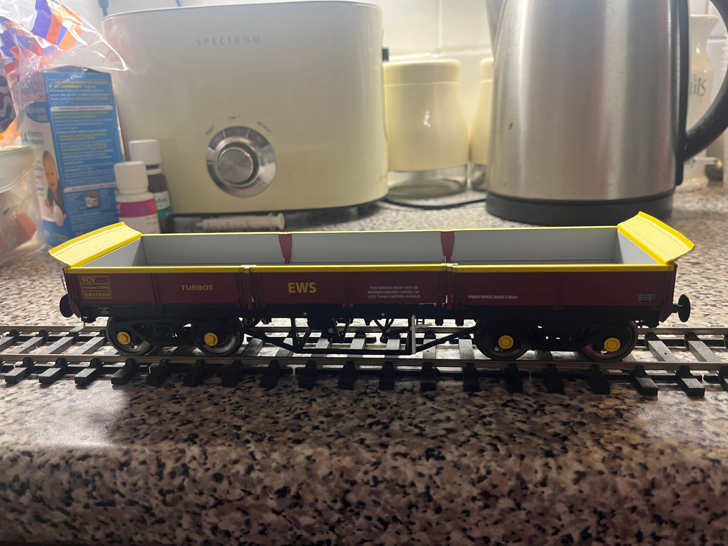 Dapol (O) Ex British Rail, YCV “Turbot” No.DB978309 in EWS Yellow and Maroon.